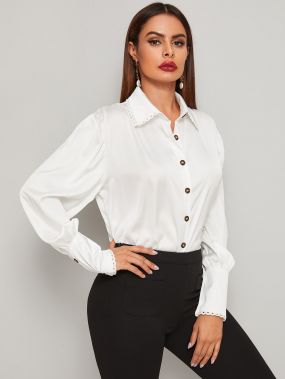Атласная блуза с оригинальным рукавом
