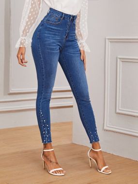 Облегающие джинсы с жемчугами и оригинальным краем