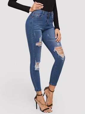 Рваные обтягивающие джинсы с высокой талией
