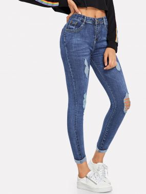 Рваные джинсы с отбортовками