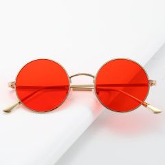 Солнцезащитные очки с тонированными линзами в круглой оправе