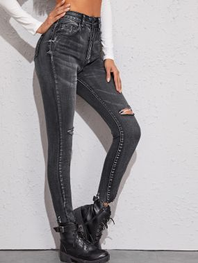 Рваные облегающие джинсы с оригинальным краем