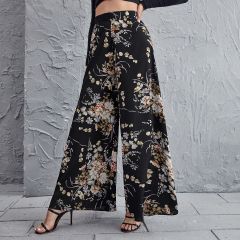 Широкие брюки с цветочным принтом и высокой талией