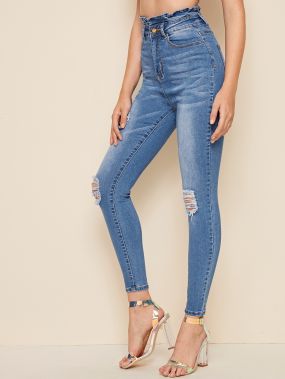 Рваные джинсы с присборенной талией